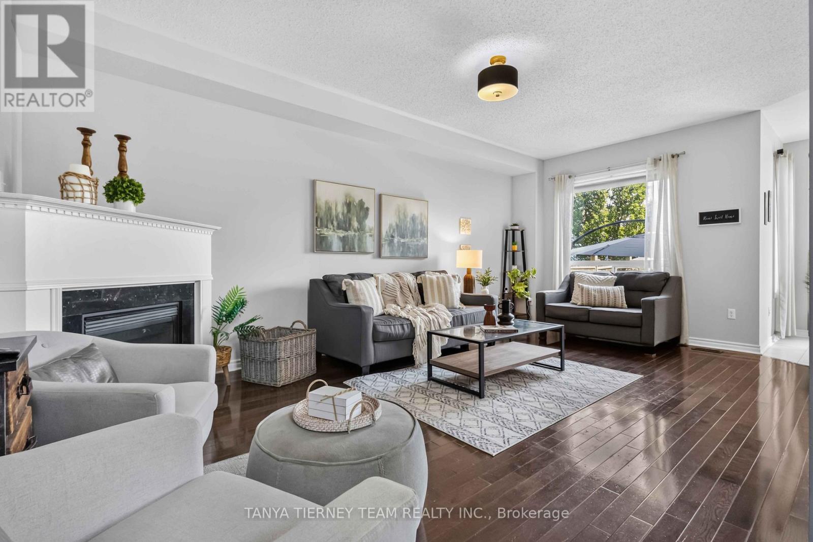 53 Chiswick Avenue, Whitby, ON - Indoor Photo Showing Living Room With Fireplace