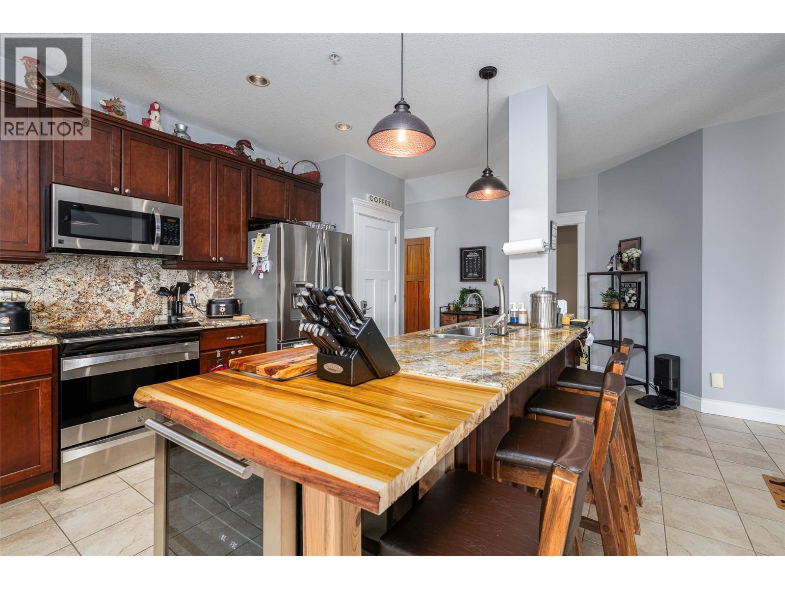 5045 Snowbird Way Unit# 2, Big White, BC - Indoor Photo Showing Kitchen With Double Sink