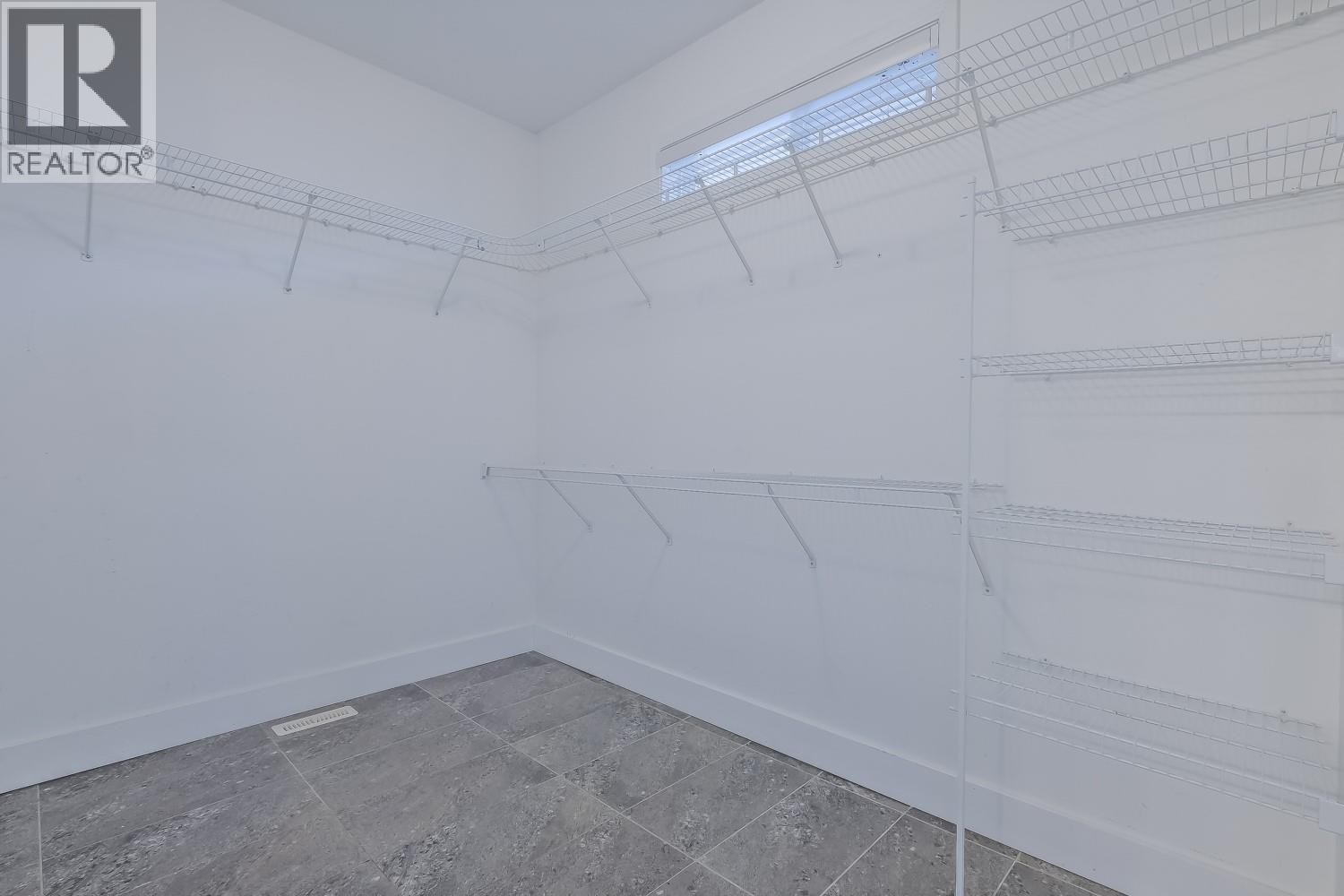 Walk-in closet - 755 Birch Avenue, Kelowna, BC - Indoor With Storage