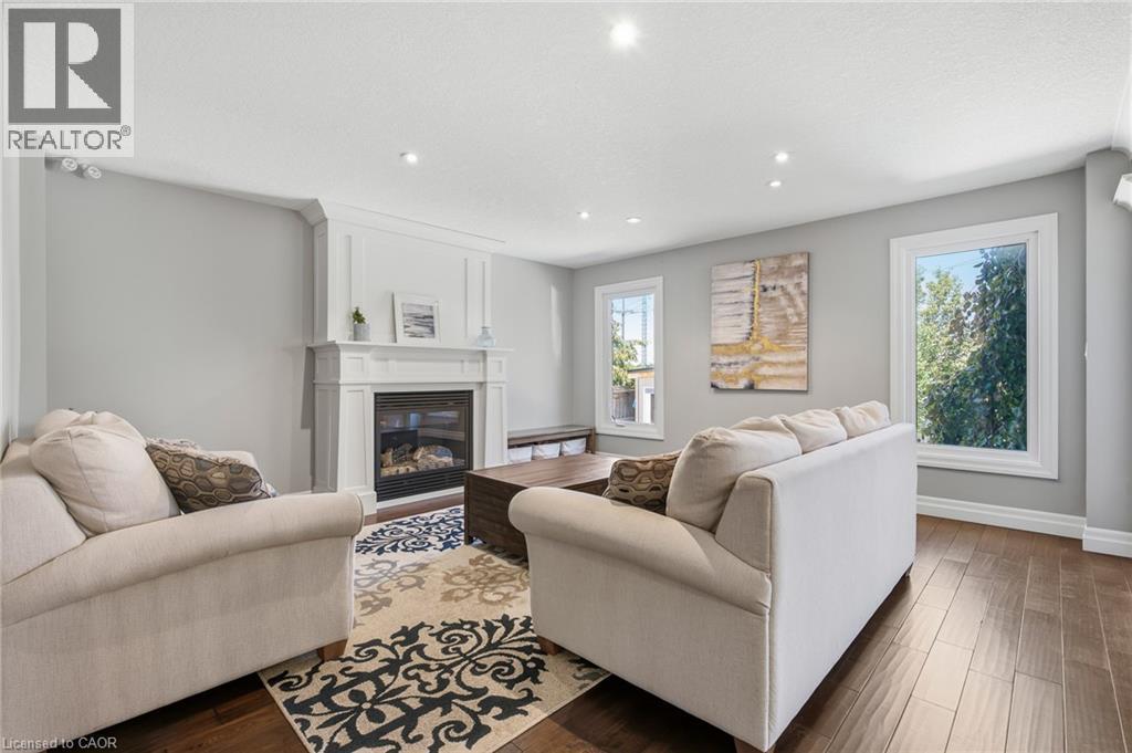 936 Dunblane Court, Kitchener, ON - Indoor Photo Showing Living Room With Fireplace