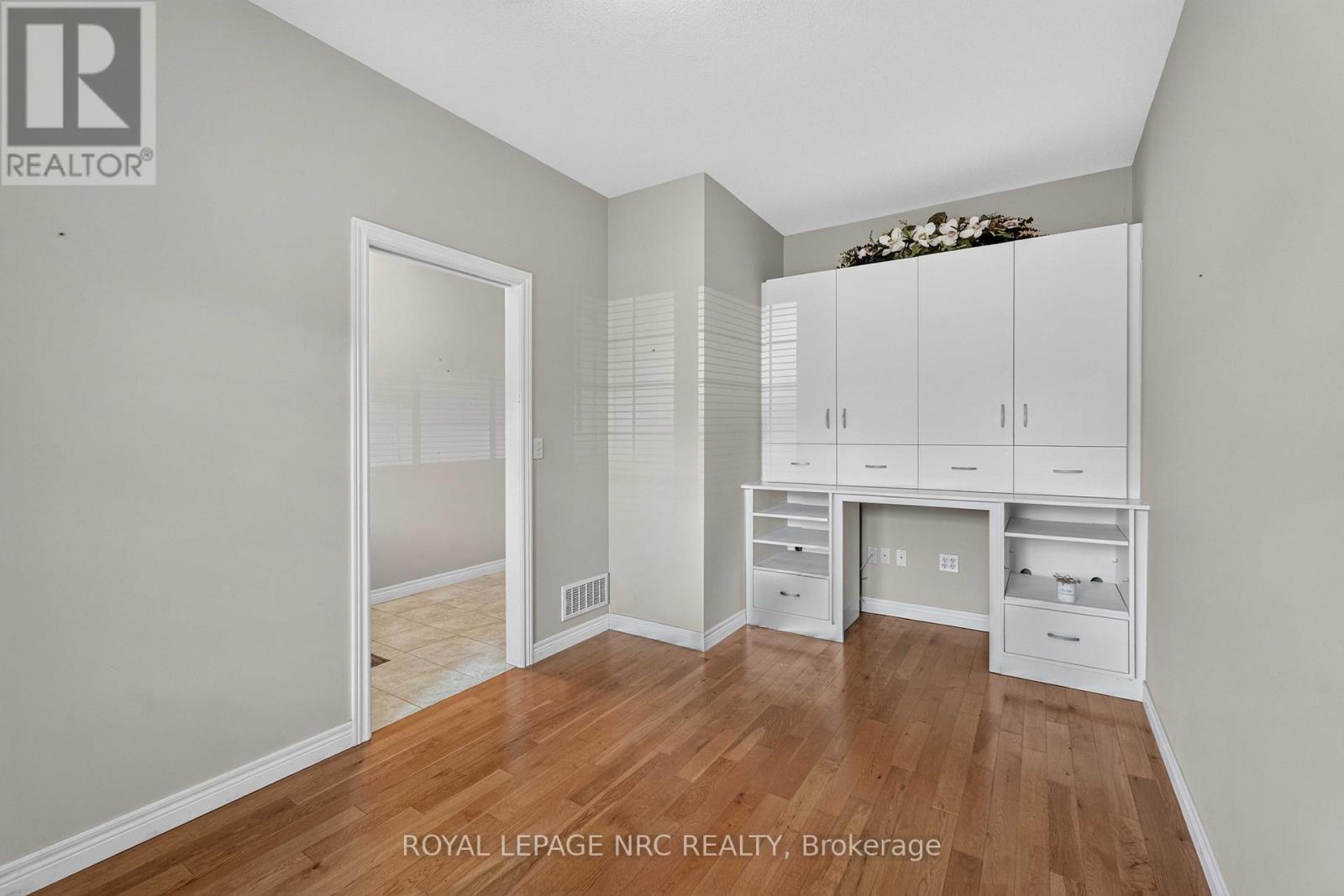 Bedroom Includes Cabinetry and Shelving - 82 Maple Street, Port Colborne (Sugarloaf), ON - Indoor Photo Showing Other Room