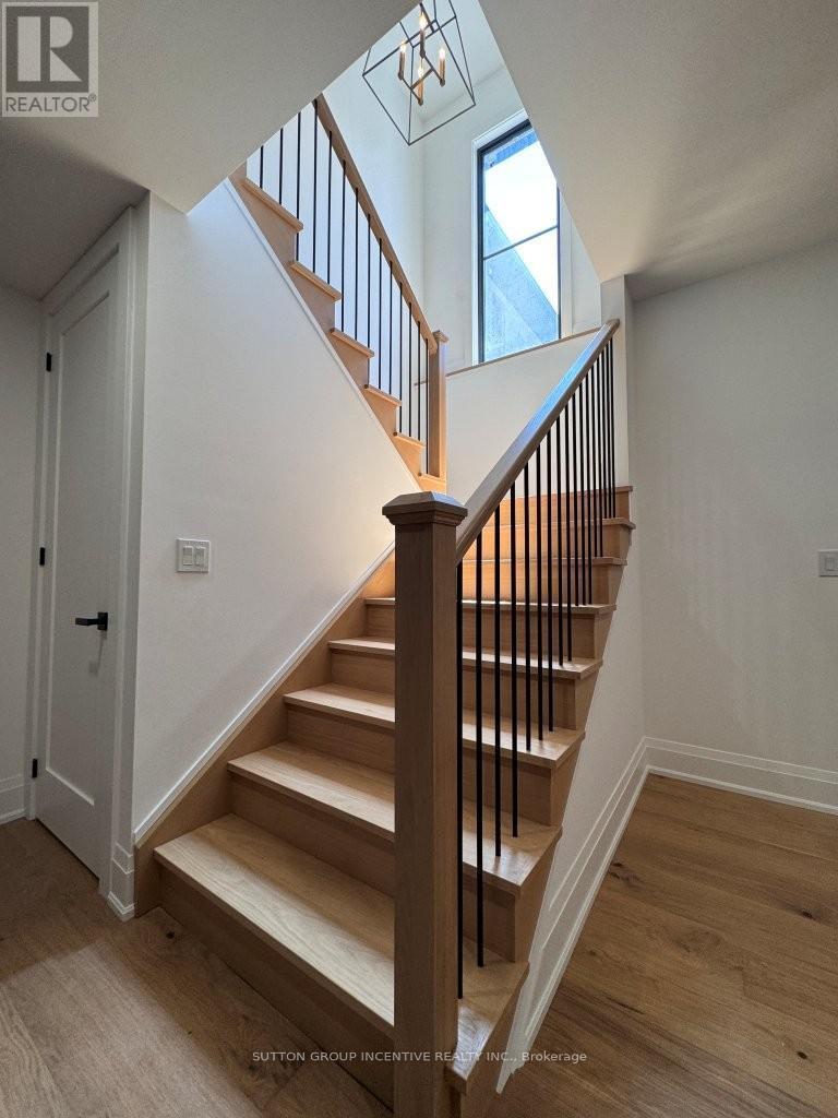 Staircase to Basement - 5 Jean Miller Court, Springwater, ON - Indoor Photo Showing Other Room