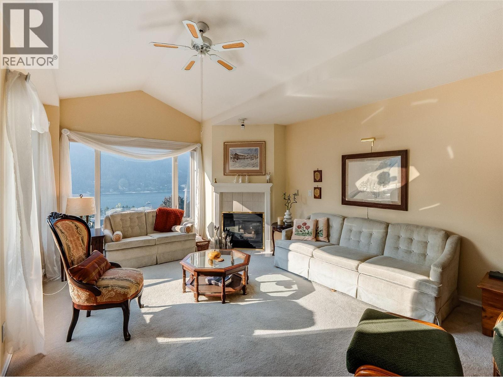 38 High Street Unit# 307, Nelson, BC - Indoor Photo Showing Living Room With Fireplace