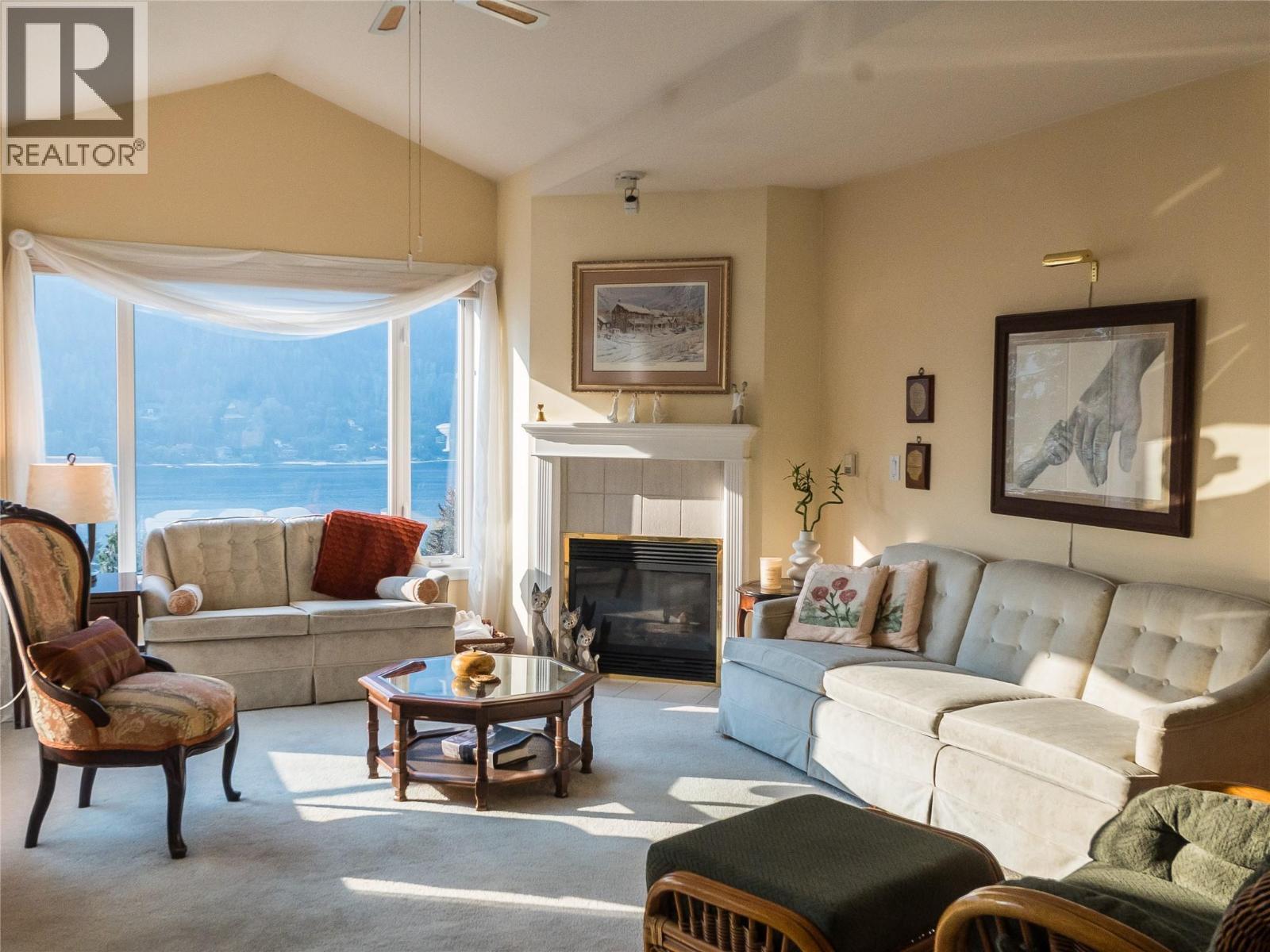 38 High Street Unit# 307, Nelson, BC - Indoor Photo Showing Living Room With Fireplace