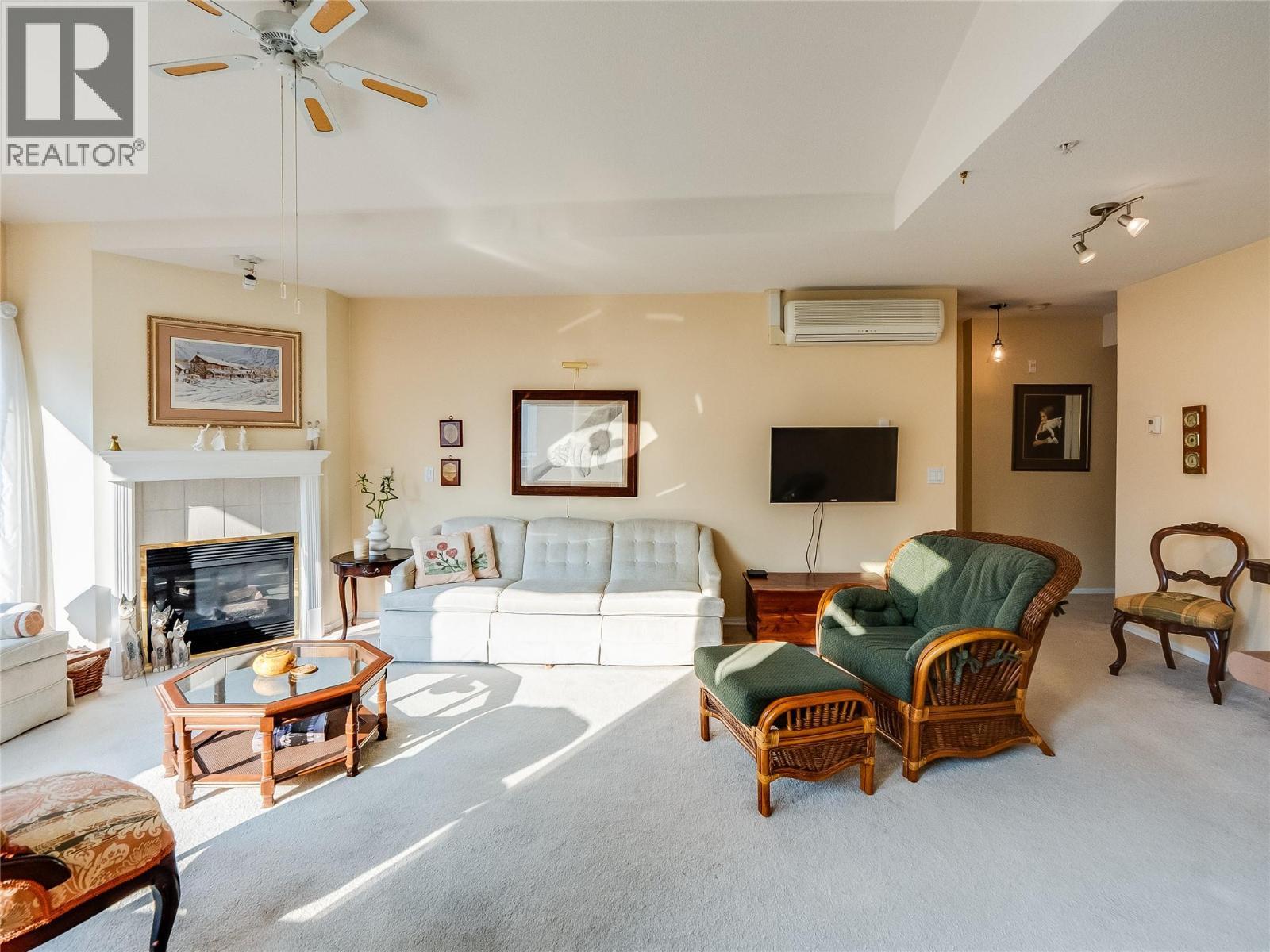 38 High Street Unit# 307, Nelson, BC - Indoor Photo Showing Living Room With Fireplace