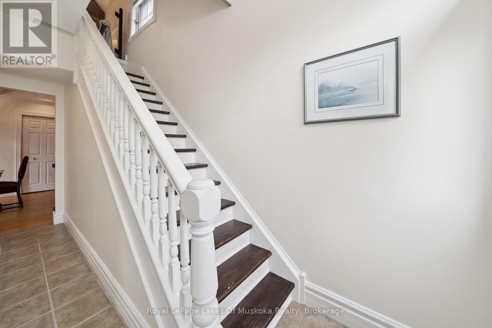 MAIN HS: Stairs to 2nd floor. - 212 James Street, Bracebridge, ON - Indoor Photo Showing Other Room