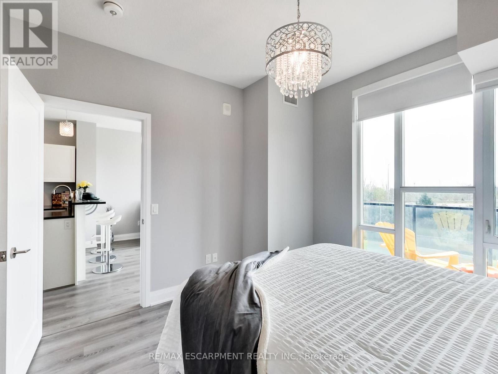 318 - 16 Concord Place, Grimsby, ON - Indoor Photo Showing Bedroom