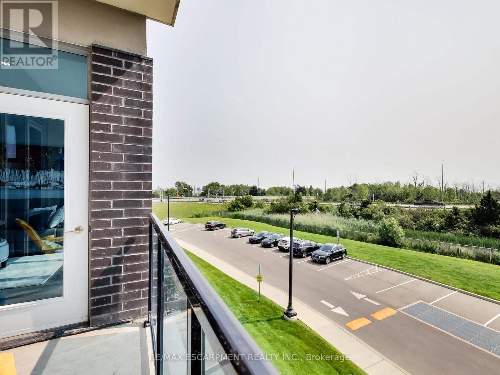 318 - 16 Concord Place, Grimsby, ON - Outdoor With Balcony