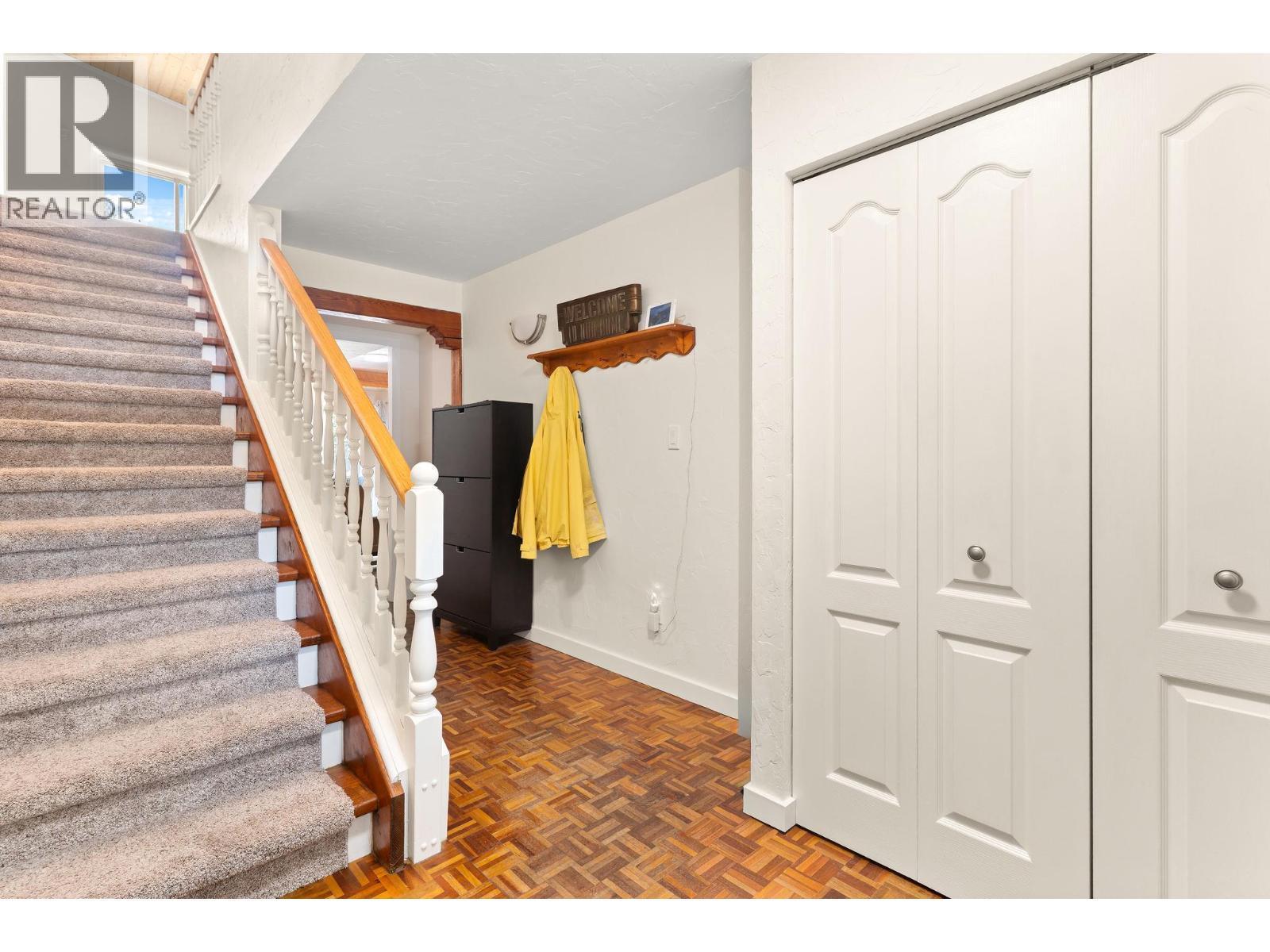 Main entrance going to both lower and upper level - 1587 Pratico Road, Revelstoke, BC - Indoor Photo Showing Other Room