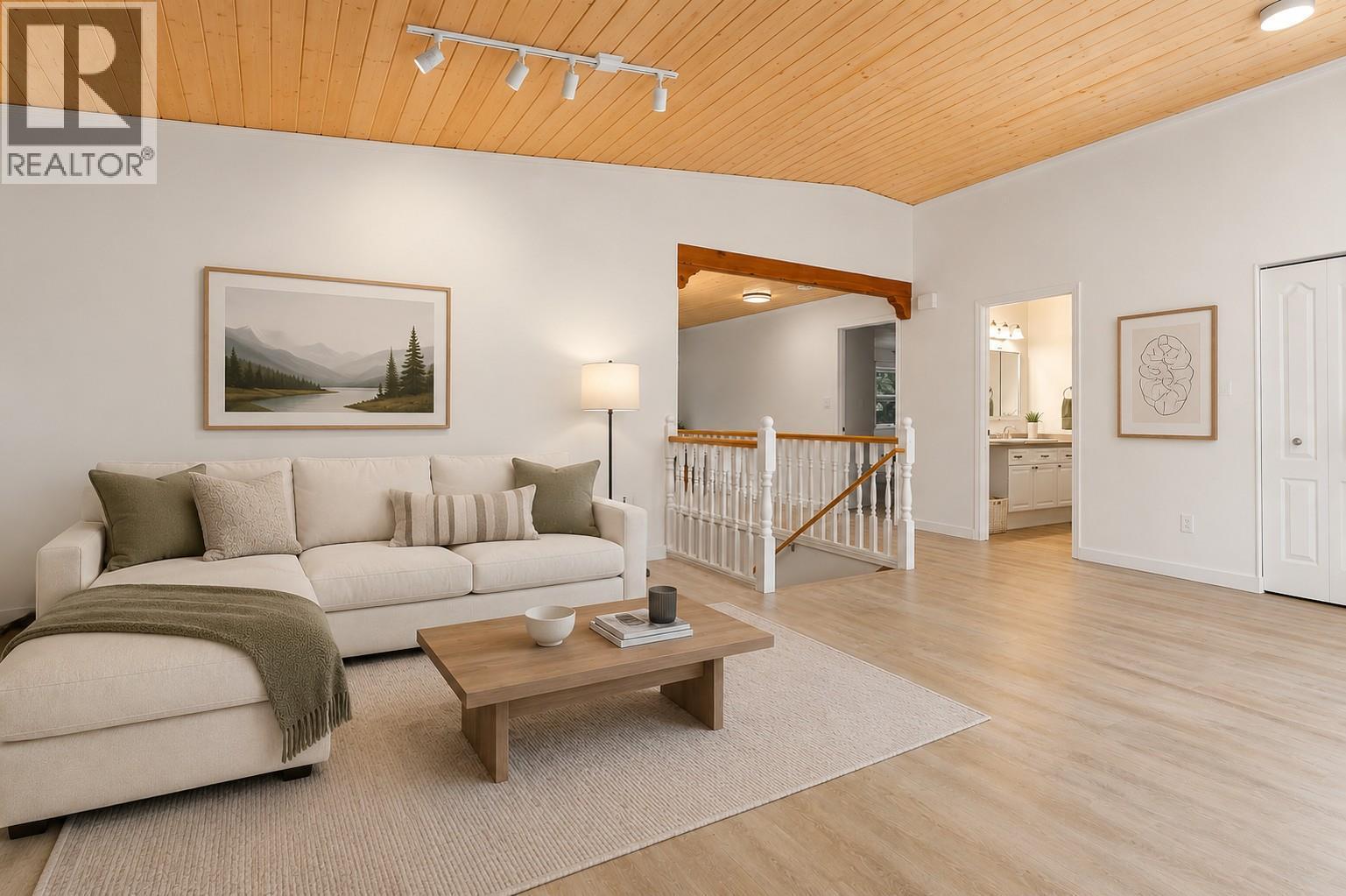 Main floor this picture digitally staged - 1587 Pratico Road, Revelstoke, BC - Indoor Photo Showing Living Room
