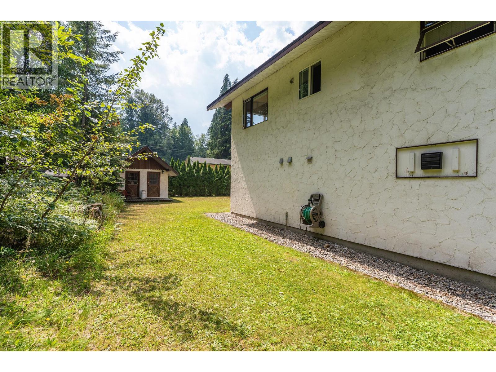 Side of home / more parking if needed - 1587 Pratico Road, Revelstoke, BC - Outdoor