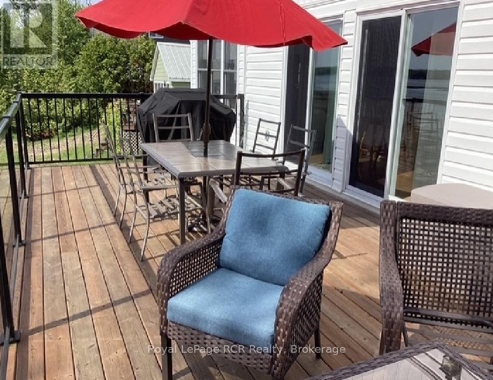 WATCHING THE WORLD GO BY - 48 Island View Drive N, South Bruce Peninsula, ON - Outdoor With Deck Patio Veranda With Exterior