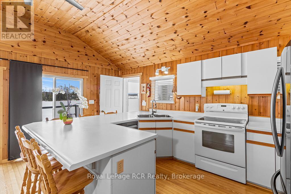 LOTS OF CABINETRY - 48 Island View Drive N, South Bruce Peninsula, ON - Indoor Photo Showing Kitchen With Double Sink