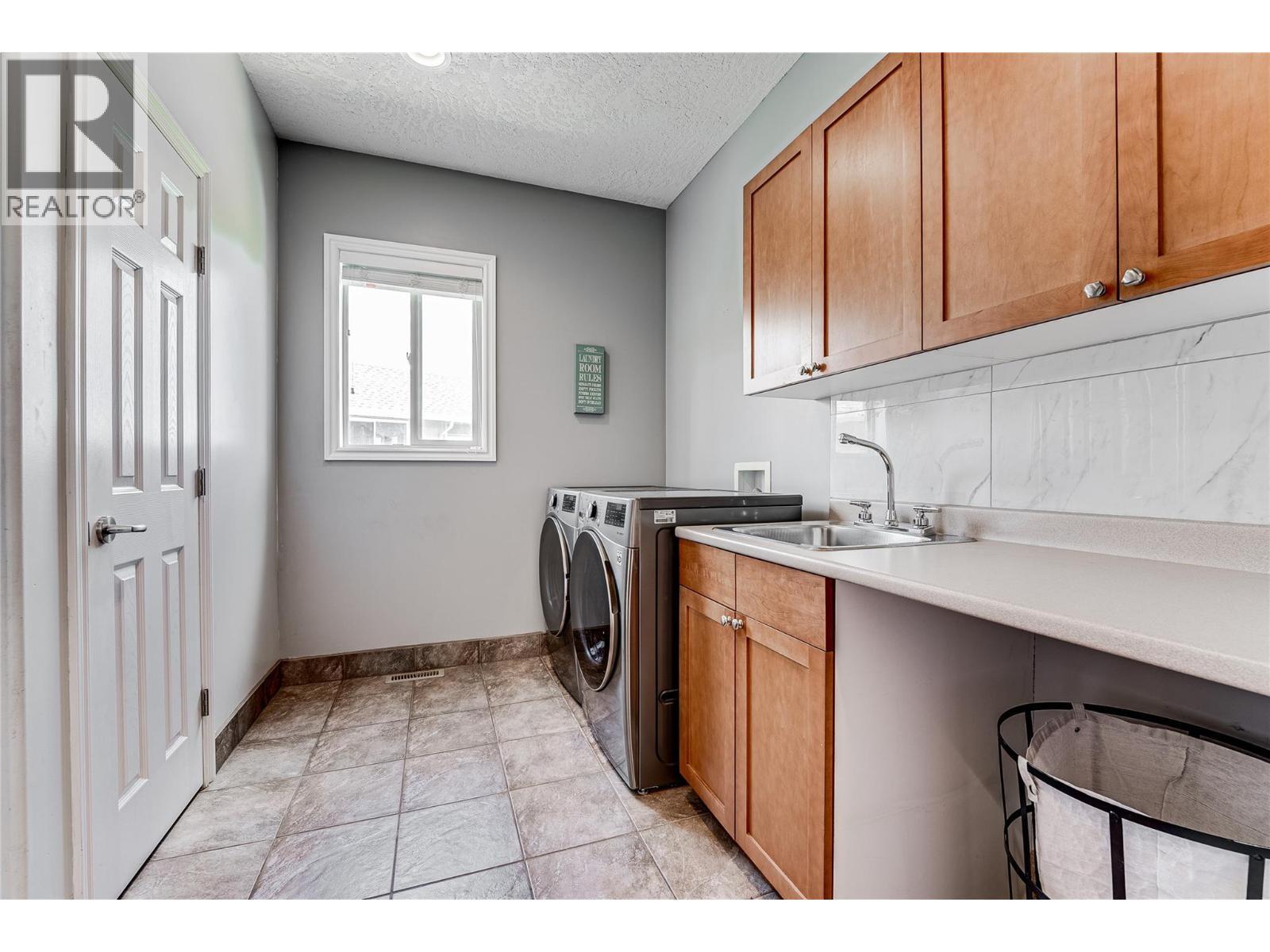 108 Red Rock Crescent, Enderby, BC - Indoor Photo Showing Laundry Room