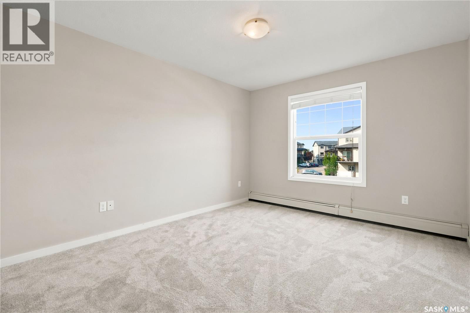 206 1510 Neville Drive, Regina, SK - Indoor Photo Showing Other Room