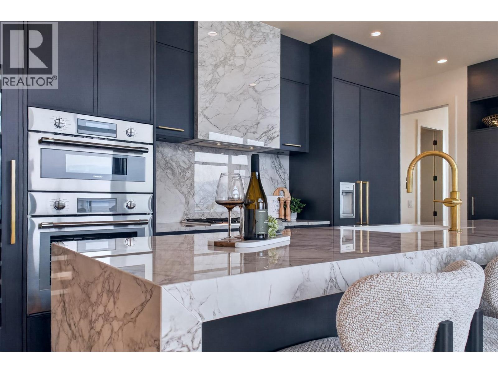 Beautiful waterfall island - 3800 Capozzi Road Unit# Ph2, Kelowna, BC - Indoor Photo Showing Kitchen