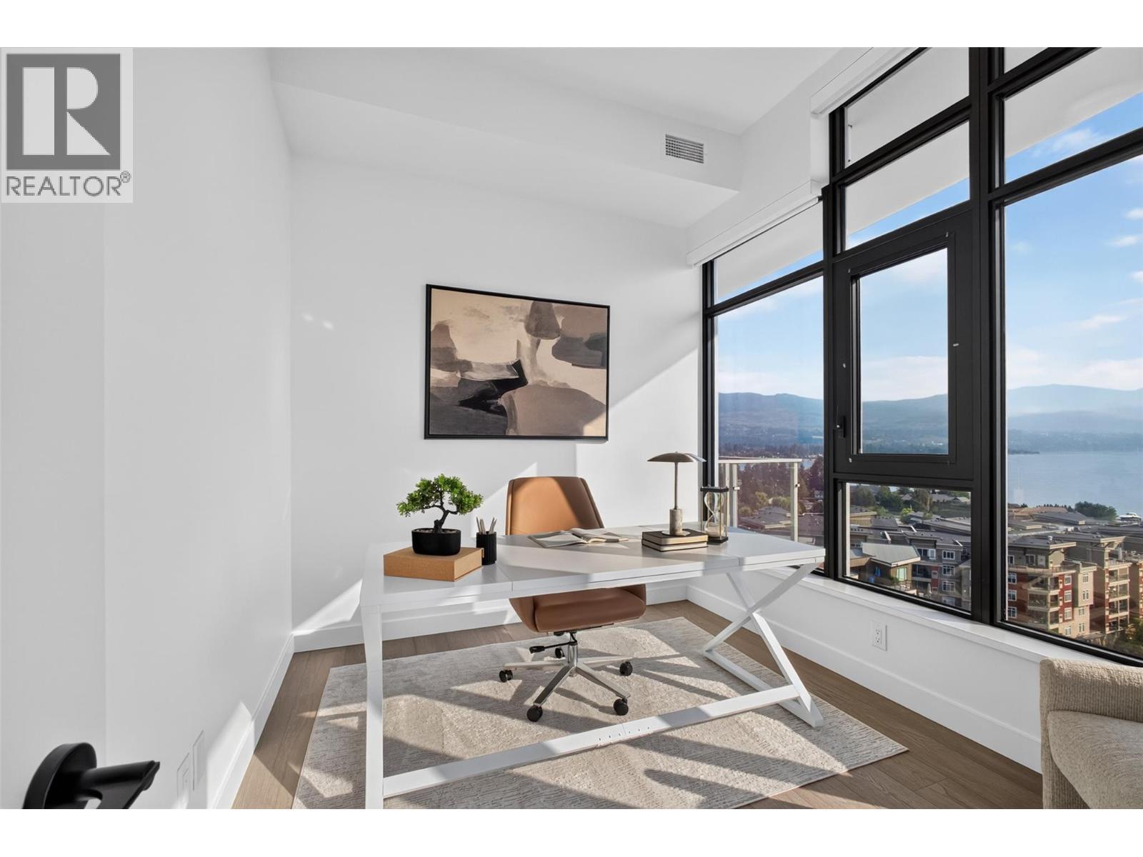With expansive windows to capture natural light - 3800 Capozzi Road Unit# Ph2, Kelowna, BC - Indoor Photo Showing Other Room