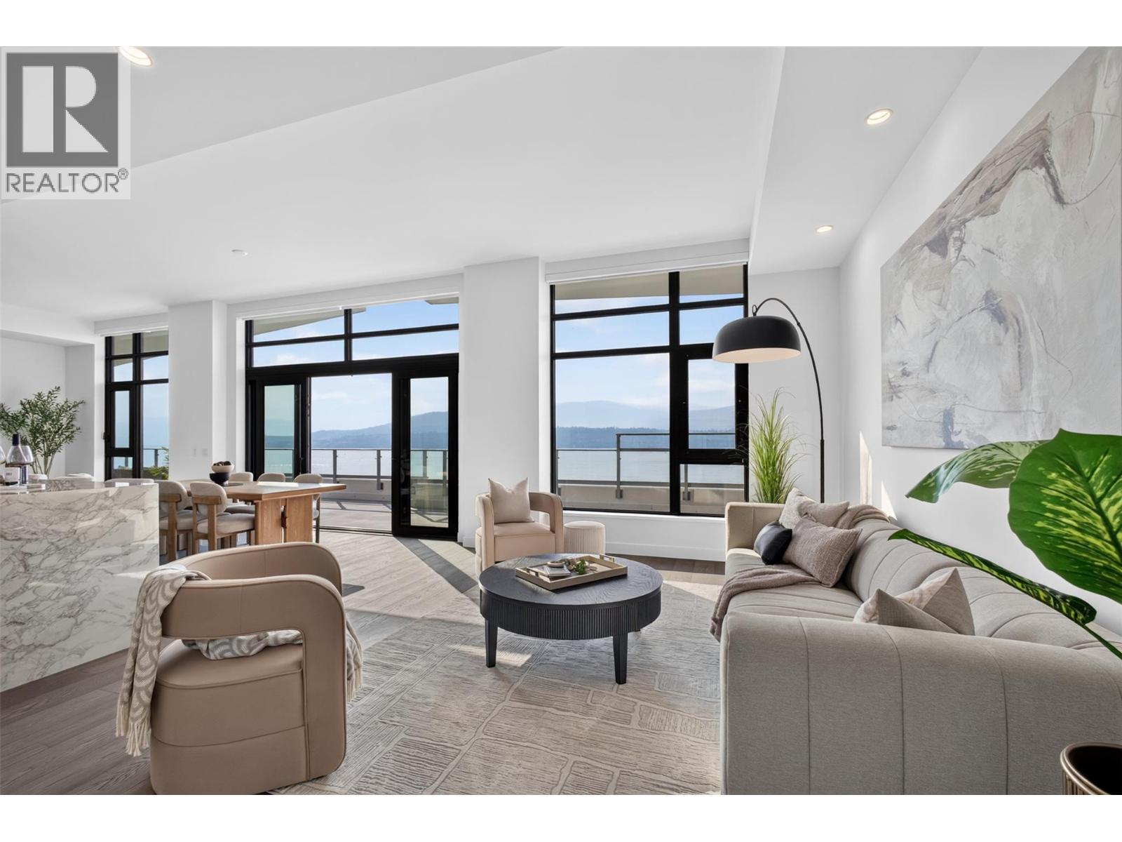 Every gathering deserves this backdrop - 3800 Capozzi Road Unit# Ph2, Kelowna, BC - Indoor Photo Showing Living Room