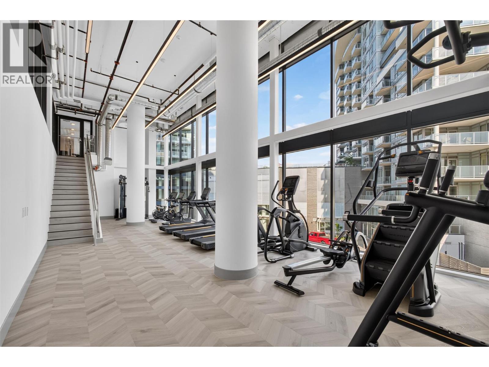 Cardio fitness area (P3) - 3800 Capozzi Road Unit# Ph2, Kelowna, BC - Indoor Photo Showing Gym Room