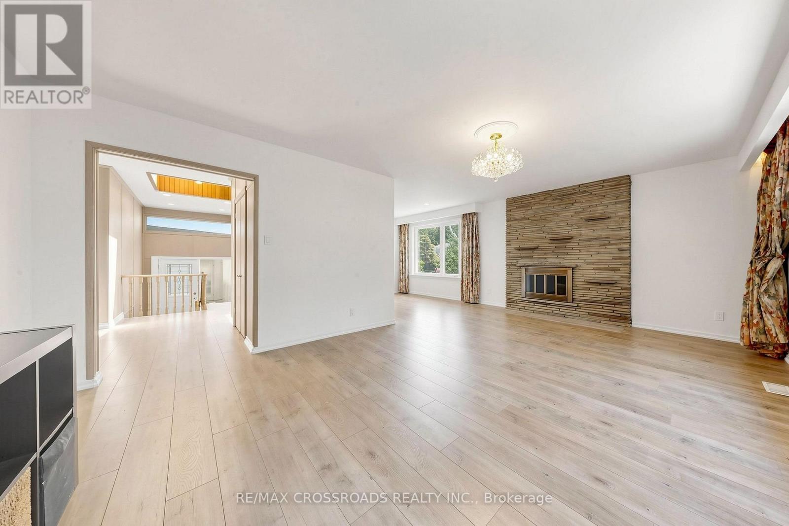 15 Alamosa Drive, Toronto, ON - Indoor Photo Showing Living Room With Fireplace