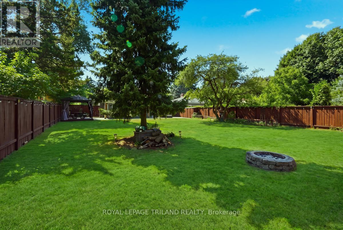 Backyard fire pit. - 308 Reynolds Road, London South (South B), ON - Outdoor With Backyard