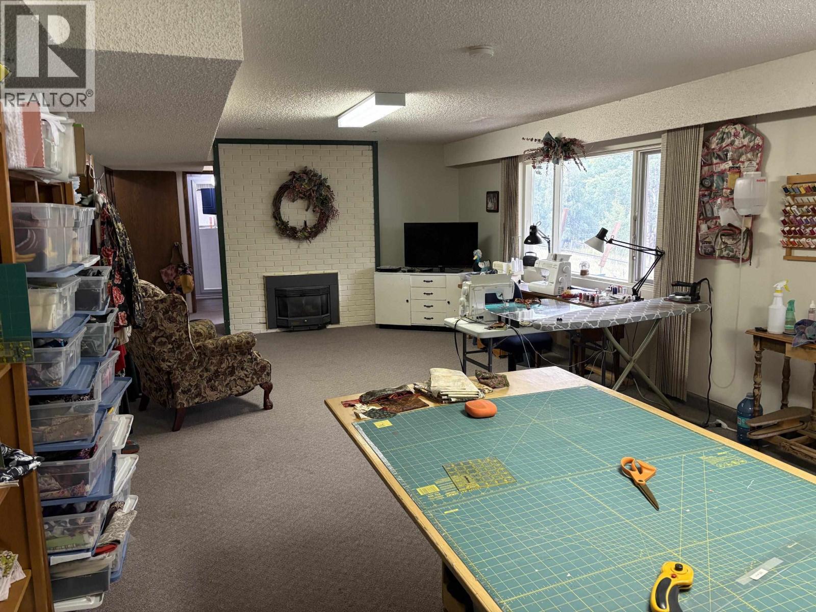404 N Birch Avenue, 100 Mile House, BC - Indoor With Fireplace