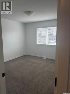 35 4850 Harbour Landing Drive, Regina, SK - Indoor Photo Showing Other Room