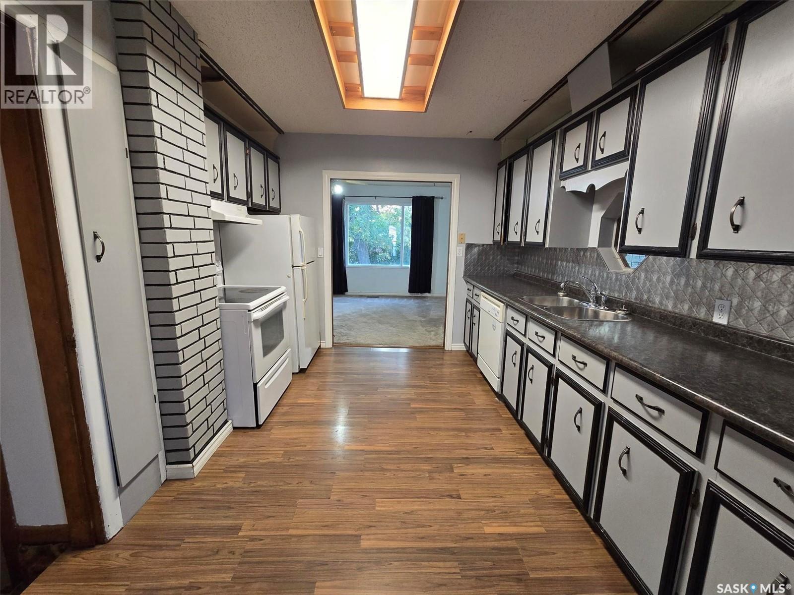 142 First Street W, Glenavon, SK - Indoor Photo Showing Kitchen With Double Sink