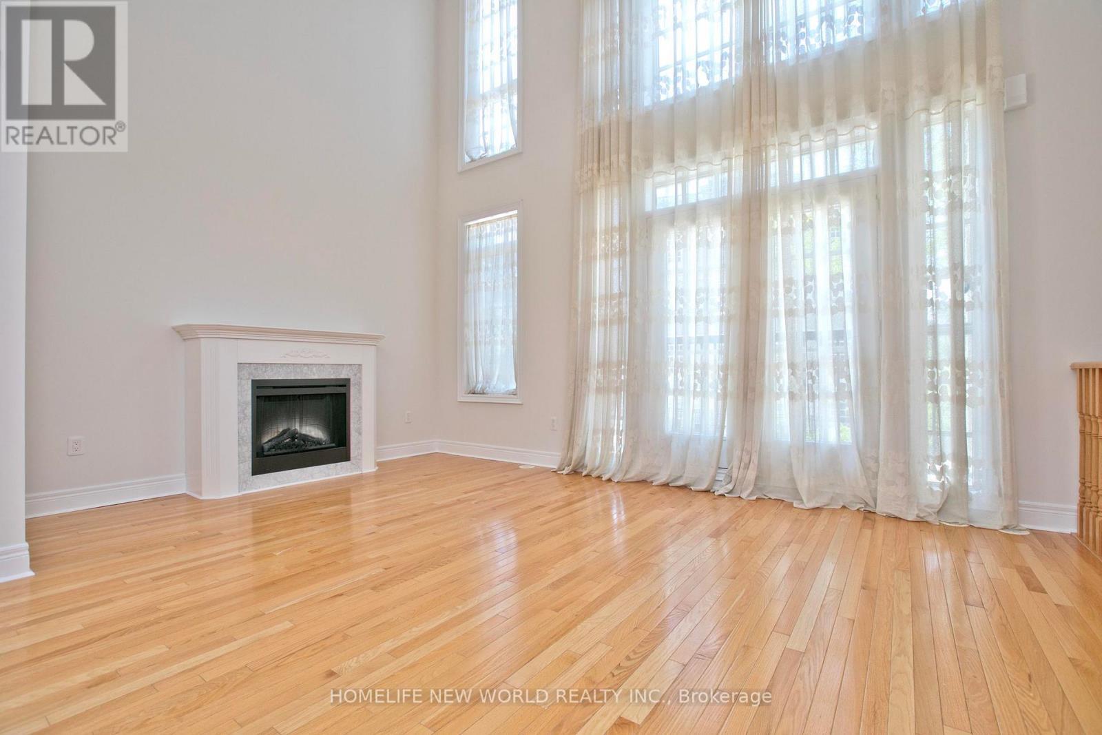 1 Mackenzie'S Stand Avenue, Markham, ON - Indoor Photo Showing Living Room With Fireplace