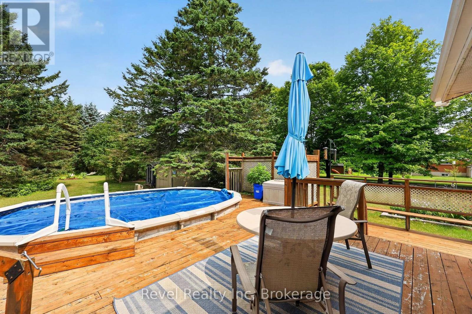 459 Cedar Point Road, Tiny, ON - Outdoor With Above Ground Pool
