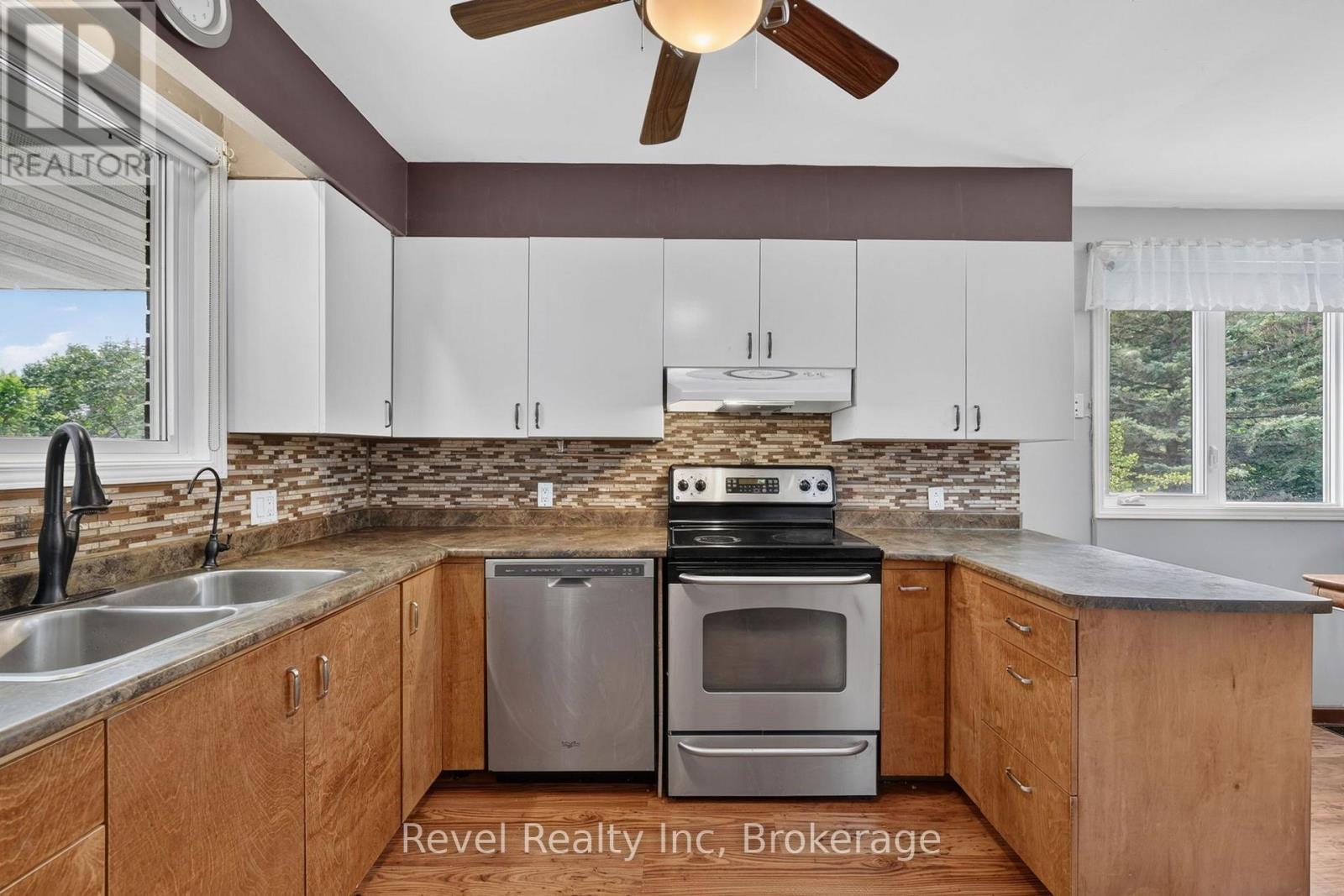 459 Cedar Point Road, Tiny, ON - Indoor Photo Showing Kitchen With Double Sink