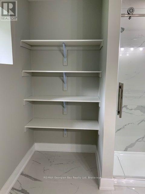 5 Oakwood Avenue S, Tiny, ON - Indoor With Storage