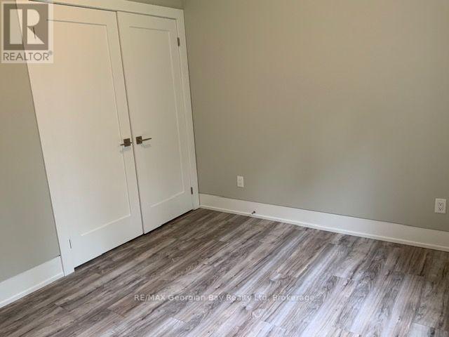 5 Oakwood Avenue S, Tiny, ON - Indoor Photo Showing Other Room