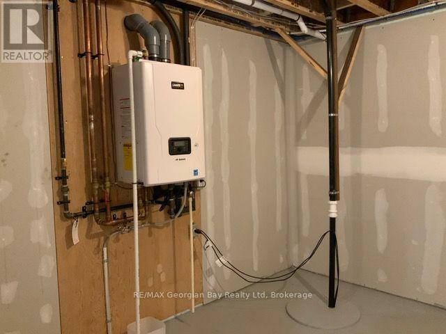 5 Oakwood Avenue S, Tiny, ON - Indoor Photo Showing Basement