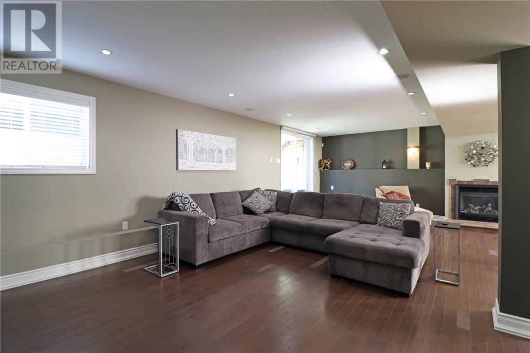 3086 Rebecca Street, Val Caron, ON - Indoor Photo Showing Living Room With Fireplace