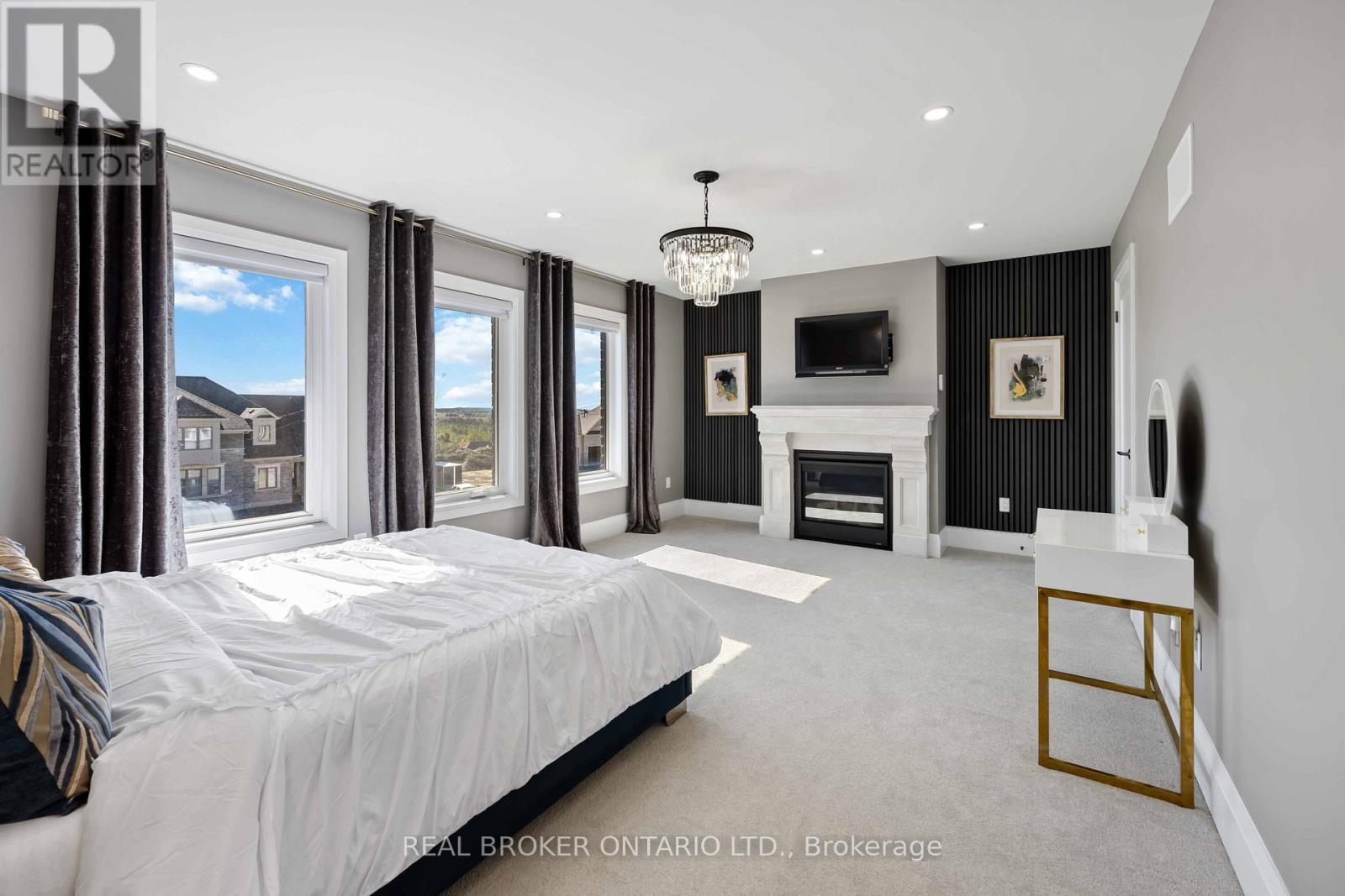 2236 Pemberton Way, Innisfil, ON - Indoor Photo Showing Bedroom With Fireplace
