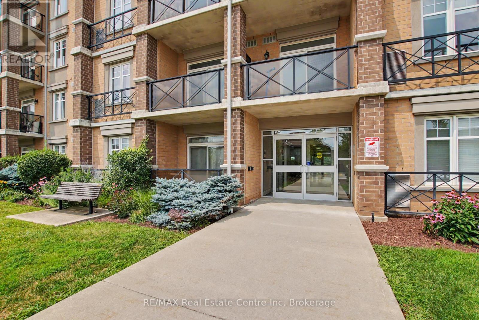 410 - 2 Colonial Drive, Guelph (Pineridge/Westminster Woods), ON - Outdoor With Balcony With Facade