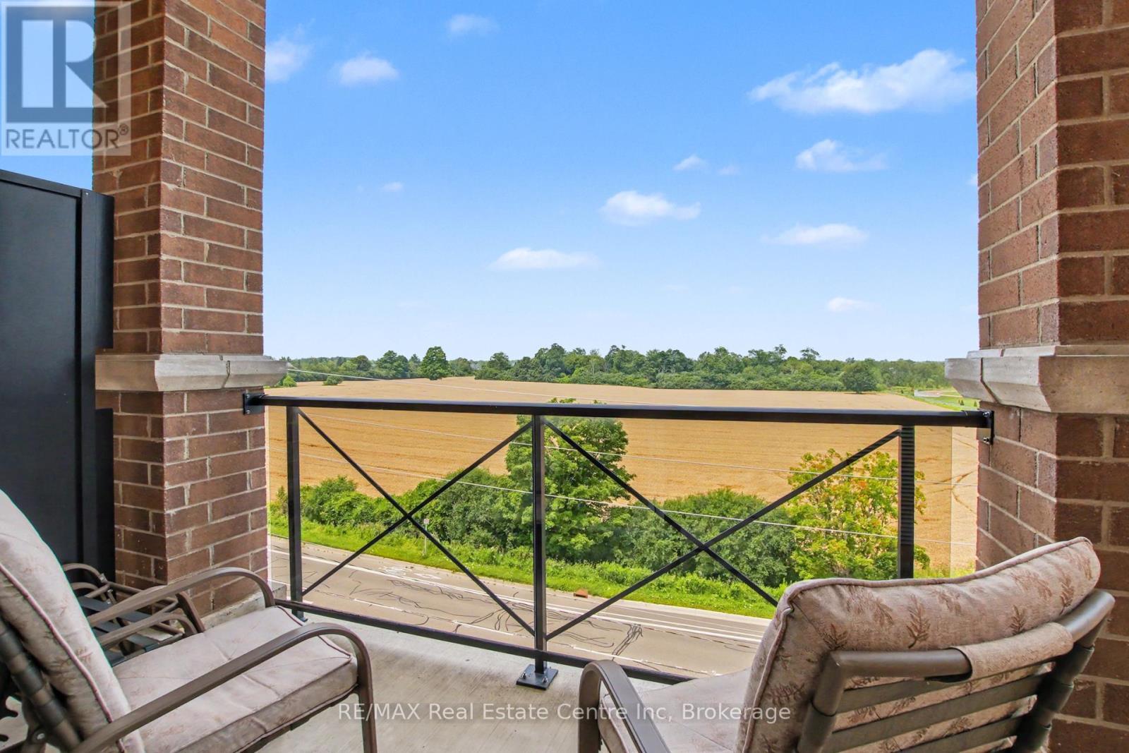 410 - 2 Colonial Drive, Guelph (Pineridge/Westminster Woods), ON - Outdoor With Balcony