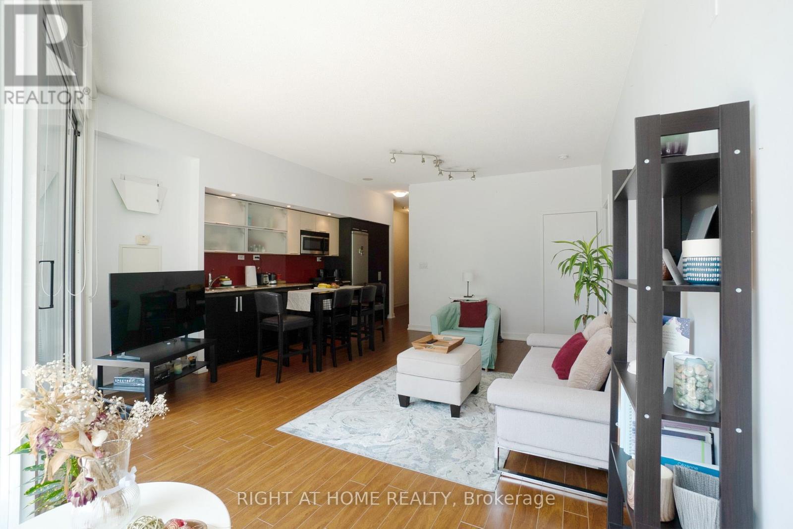 310 - 25 Capreol Court, Toronto, ON - Indoor Photo Showing Living Room