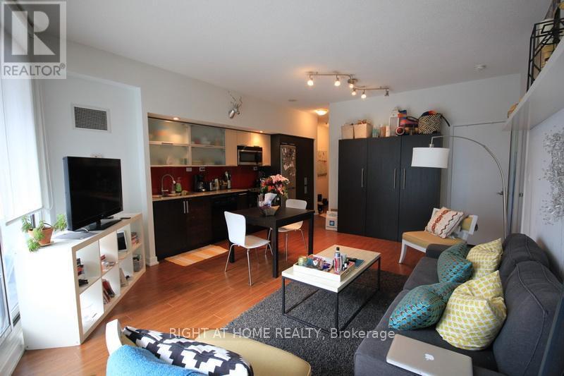 310 - 25 Capreol Court, Toronto, ON - Indoor Photo Showing Living Room