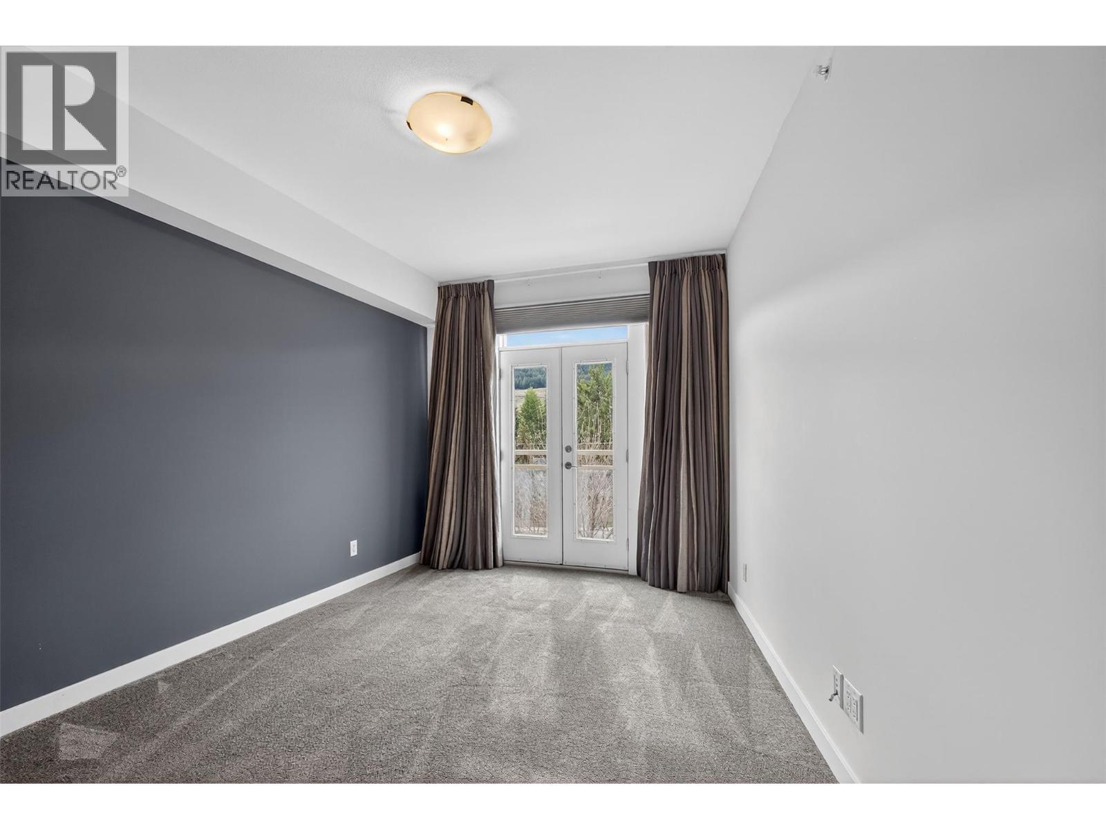 Bright And Spacious Primary Bedroom - 7343 Okanagan Landing Road Unit# 2402, Vernon, BC - Indoor Photo Showing Other Room