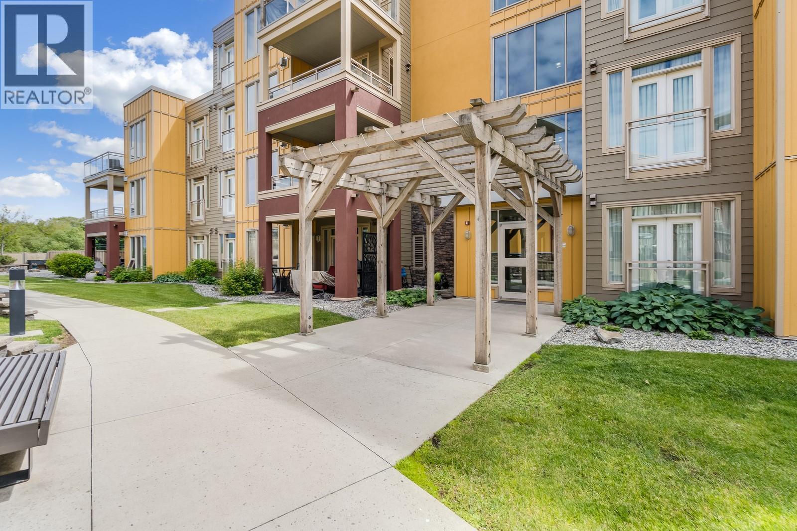 7343 Okanagan Landing Road Unit# 2402, Vernon, BC - Outdoor With Balcony With Facade