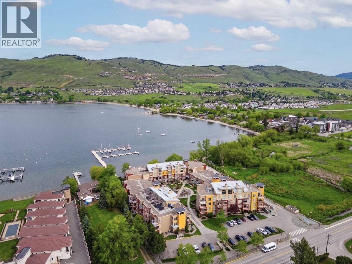 Enjoy A Prime Lakeside Location With Private Beach Access And Your Own Boat Slip - 7343 Okanagan Landing Road Unit# 2402, Vernon, BC - Outdoor With Body Of Water With View