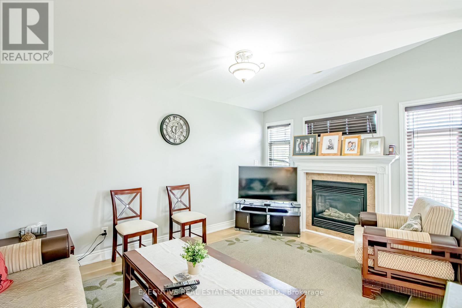 3264 Meadowgate Boulevard, London South, ON - Indoor Photo Showing Living Room With Fireplace