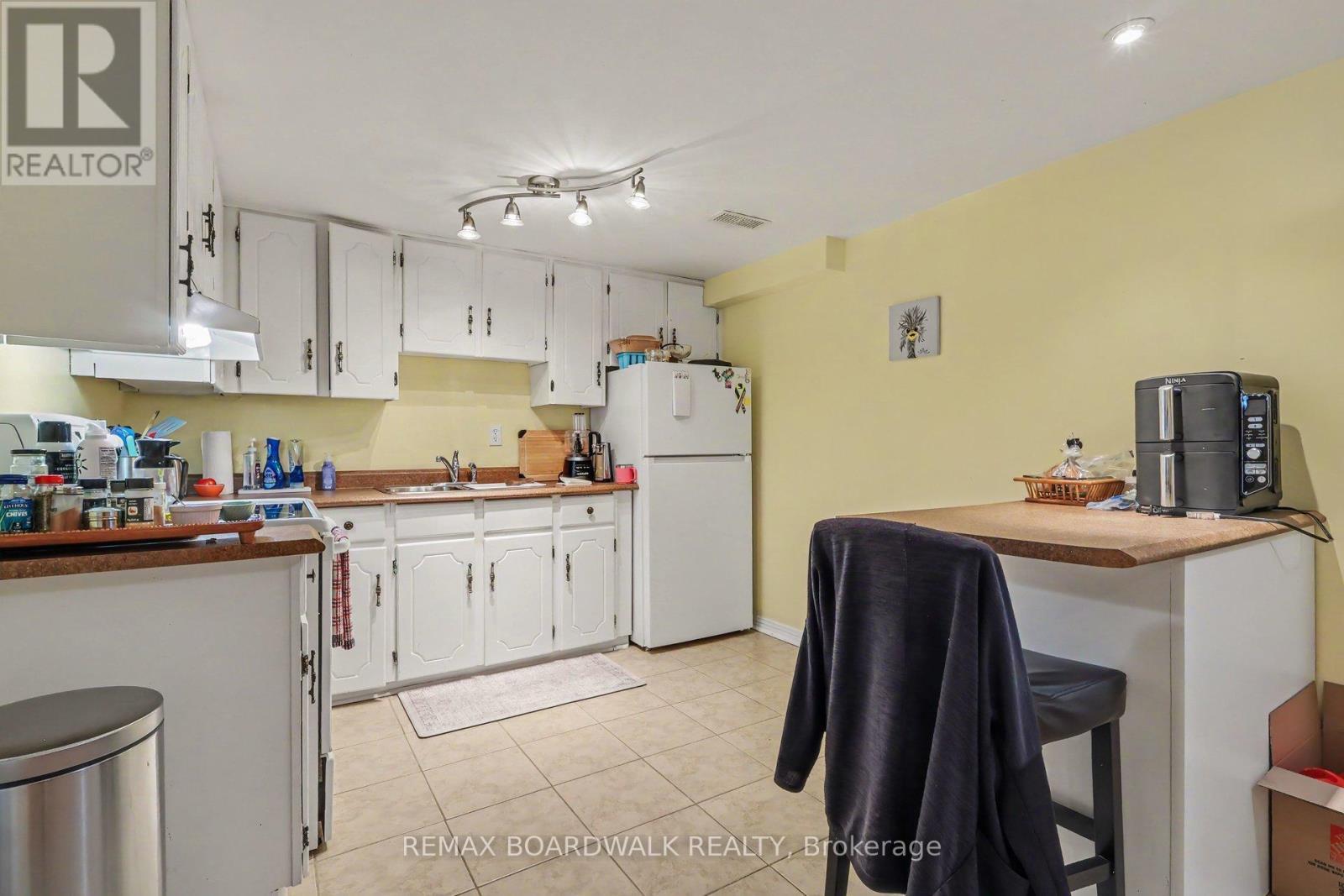 Lower Level Kitchen Area - 329 Pintail Terrace, Ottawa, ON - Indoor Photo Showing Kitchen With Double Sink