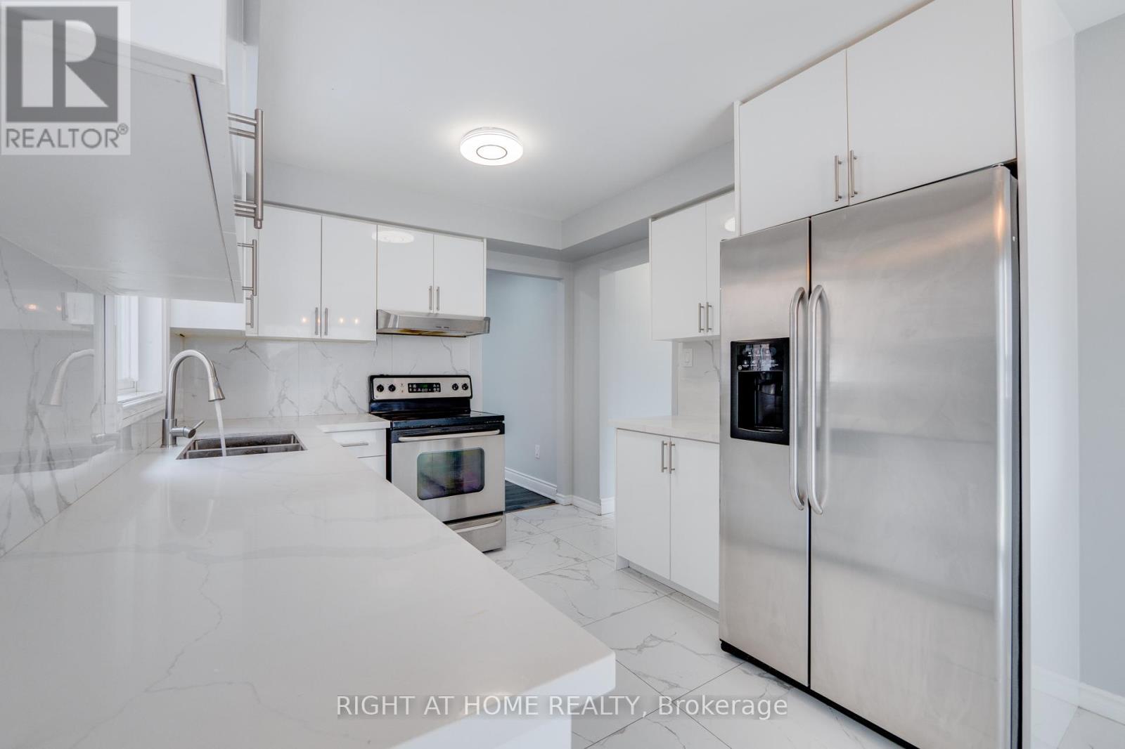 34 Meadowlark Drive, Brampton, ON - Indoor Photo Showing Kitchen With Double Sink