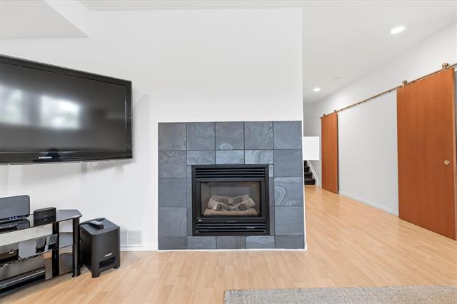 1324 Wellington Cr, Winnipeg, MB - Indoor Photo Showing Living Room With Fireplace