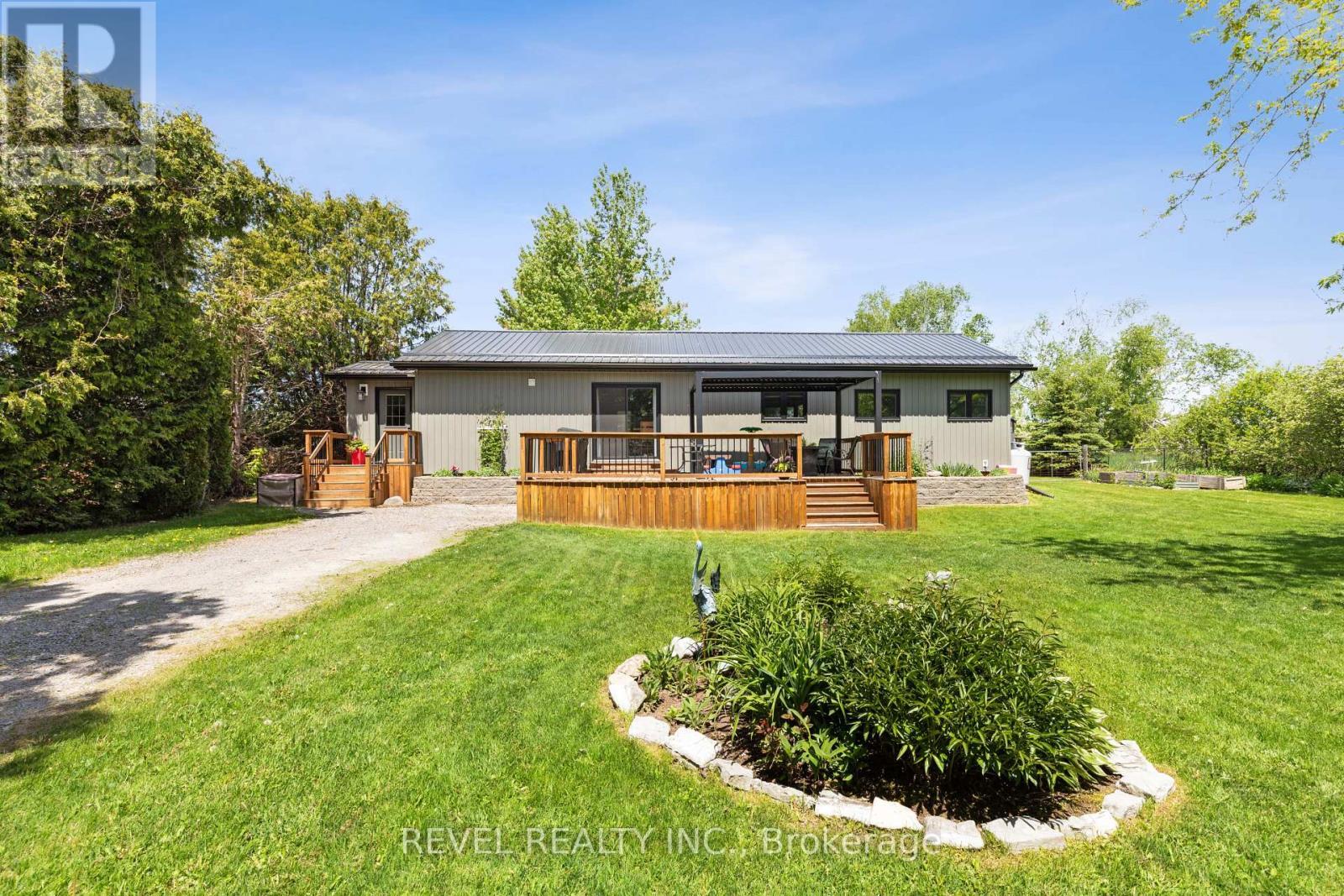 122 Mcguire Beach Road, Kawartha Lakes (Carden), ON - Outdoor With Deck Patio Veranda