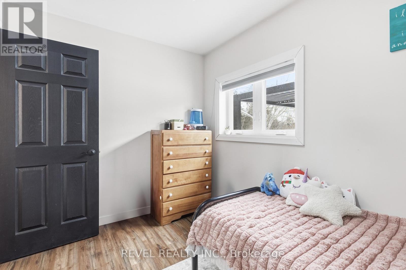 122 Mcguire Beach Road, Kawartha Lakes (Carden), ON - Indoor Photo Showing Bedroom