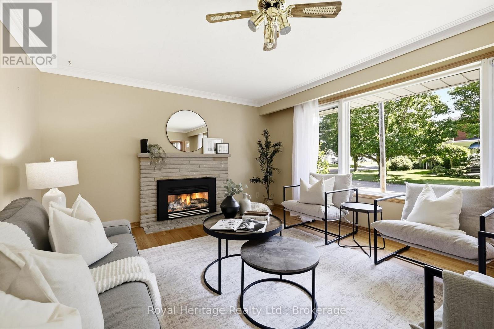 12 Simcoe Street, Whitby (Brooklin), ON - Indoor Photo Showing Living Room With Fireplace
